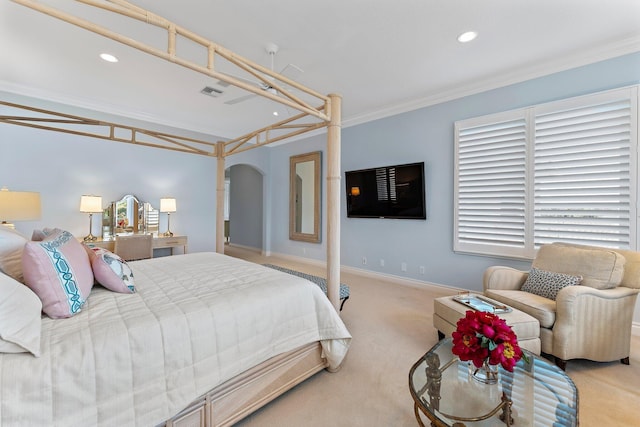 carpeted bedroom with ornamental molding