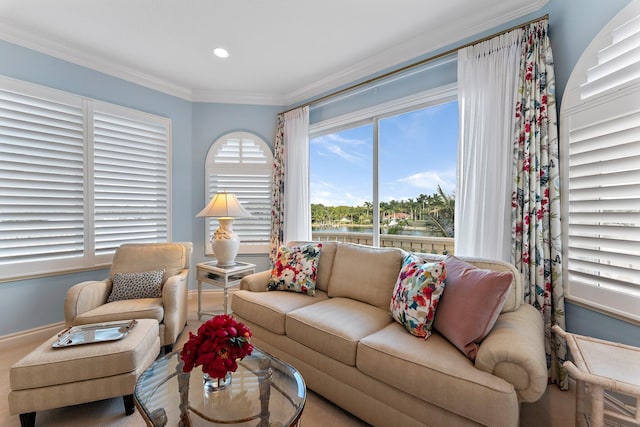 living room with crown molding and carpet