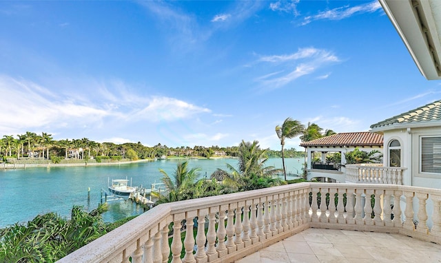 balcony featuring a water view