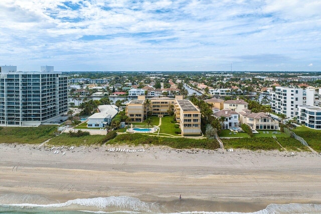 bird's eye view with a beach view and a water view