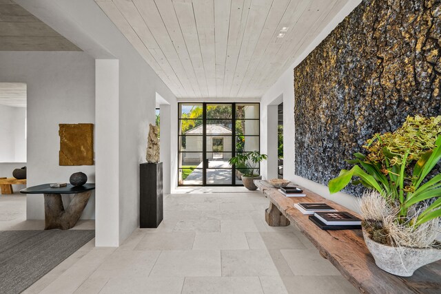 corridor featuring wooden ceiling