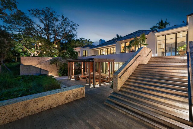 view of deck at dusk