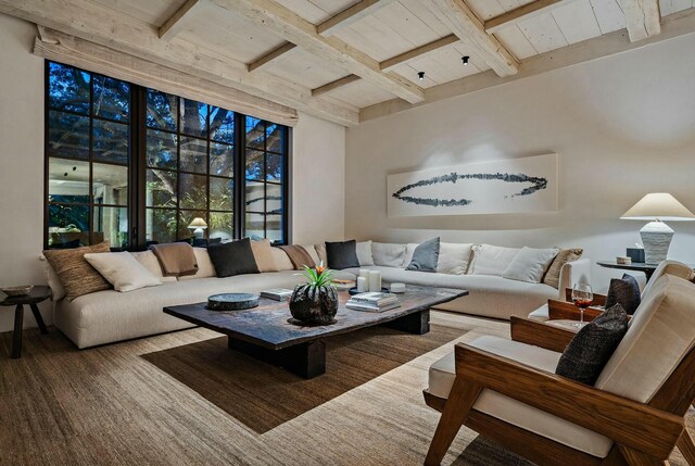 living room featuring beam ceiling, wooden ceiling, and hardwood / wood-style flooring