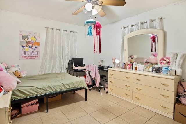 tiled bedroom with ceiling fan