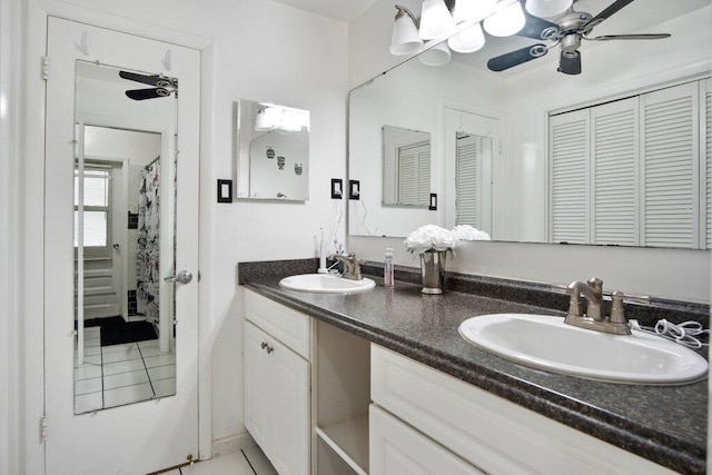 bathroom featuring vanity and ceiling fan