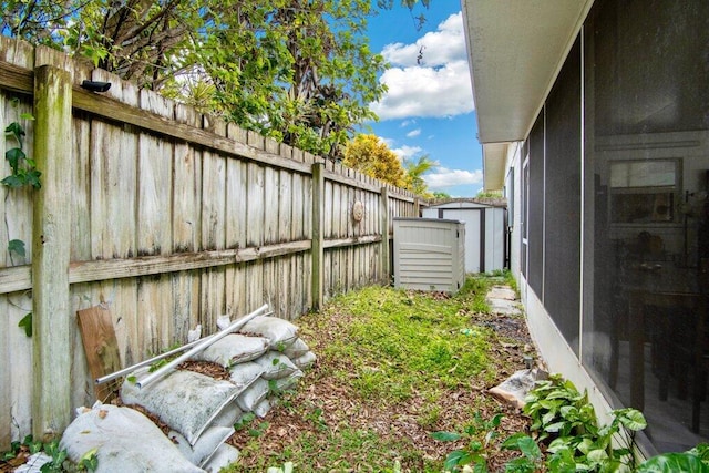 view of yard with a shed