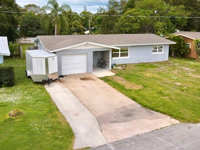 ranch-style house with a front lawn and a garage