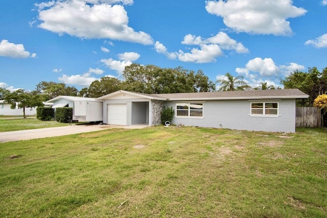 ranch-style house with a front lawn and a garage