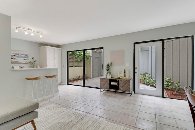 entryway featuring light tile patterned floors