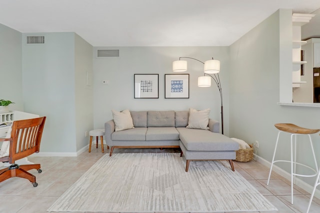 living room featuring light tile patterned flooring