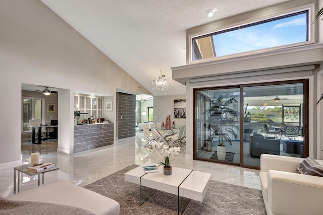 living room featuring high vaulted ceiling