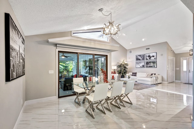 living room featuring high vaulted ceiling and an inviting chandelier