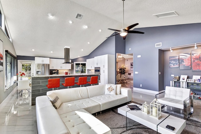 dining room featuring a textured ceiling, a chandelier, and lofted ceiling