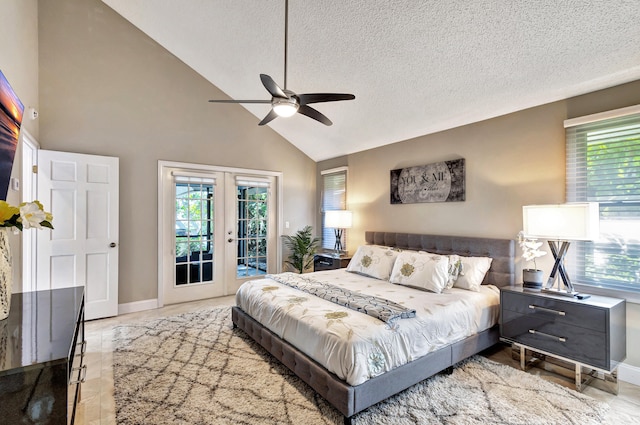 bedroom with french doors, high vaulted ceiling, multiple windows, and ceiling fan