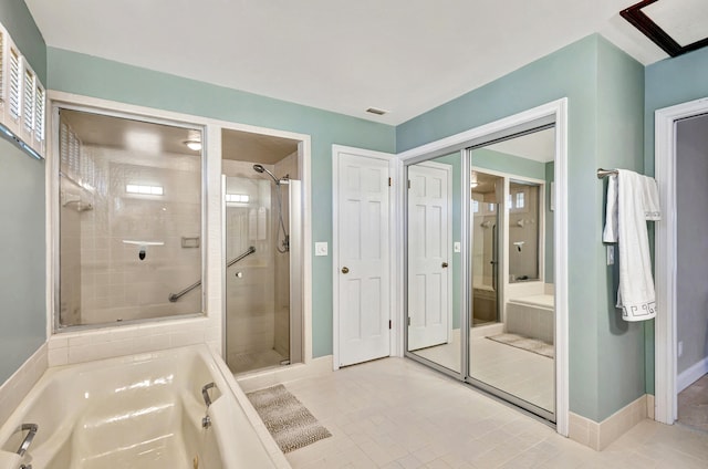 bathroom with tile patterned flooring and plus walk in shower