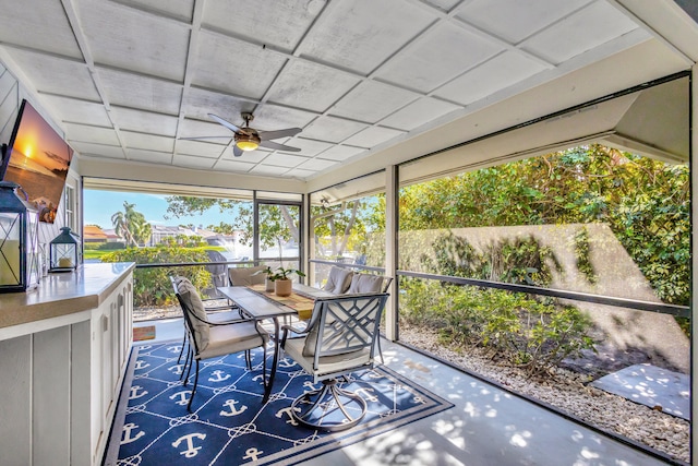 sunroom / solarium with ceiling fan