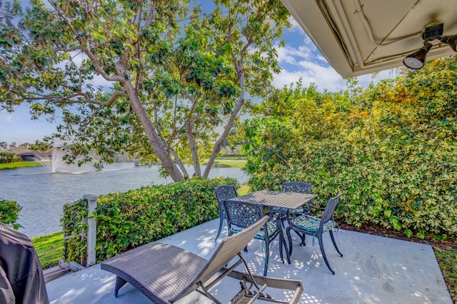 view of patio / terrace with a water view