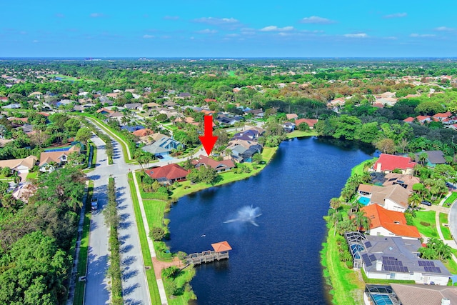 drone / aerial view featuring a water view