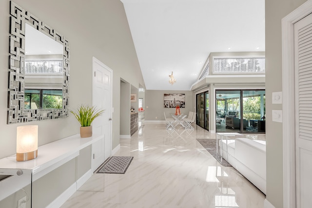 foyer entrance with vaulted ceiling