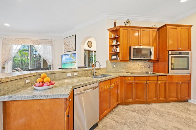 kitchen featuring backsplash, light stone counters, stainless steel appliances, crown molding, and sink