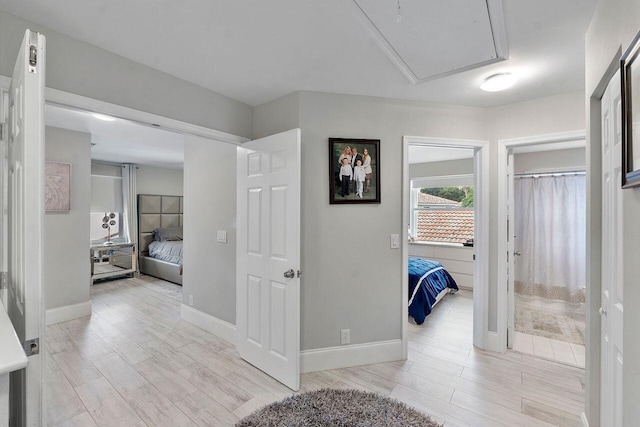 hallway featuring light hardwood / wood-style floors