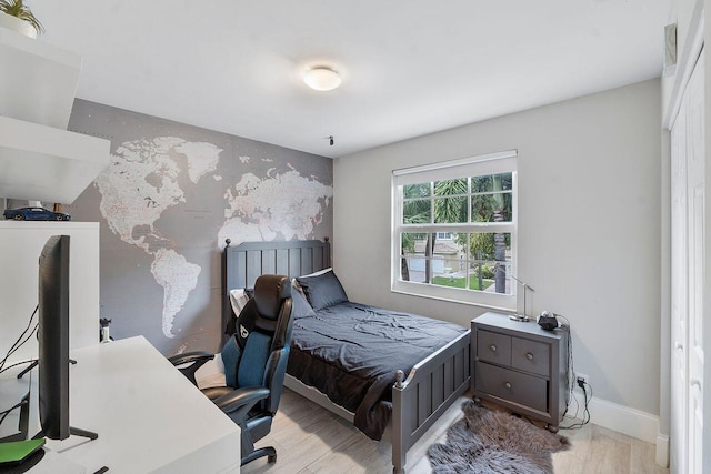 bedroom featuring light wood-type flooring