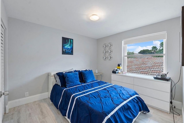 bedroom featuring light wood-type flooring