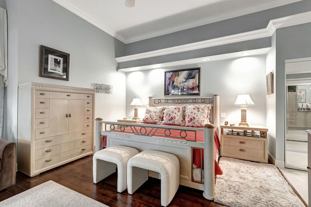 bedroom featuring ceiling fan, dark hardwood / wood-style flooring, and ornamental molding