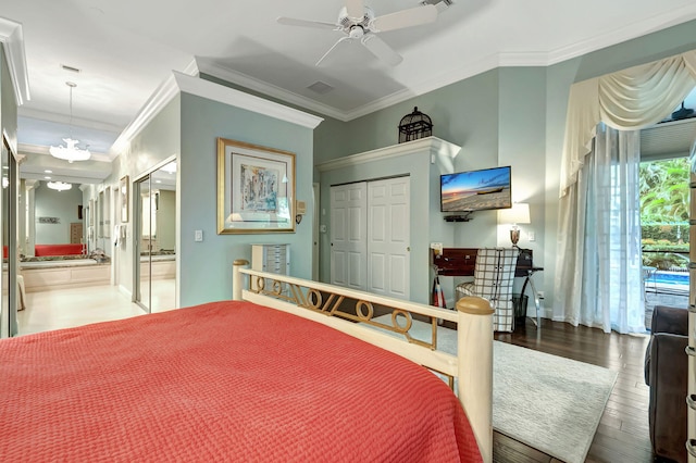 bedroom featuring a closet, hardwood / wood-style floors, ceiling fan with notable chandelier, and ornamental molding