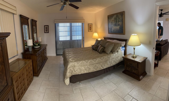 tiled bedroom with ceiling fan