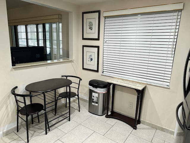 view of tiled dining space