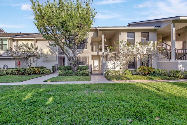 view of front of home with a front yard