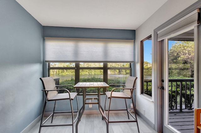 sunroom with plenty of natural light