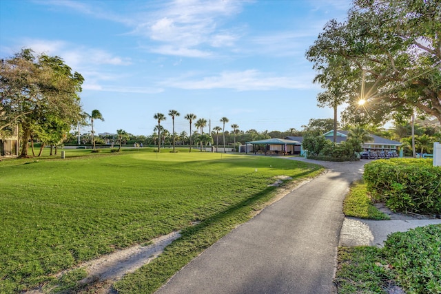 view of home's community featuring a lawn