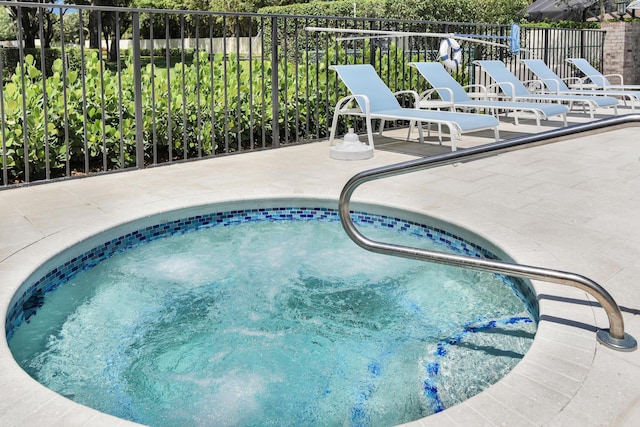 view of swimming pool with a patio area