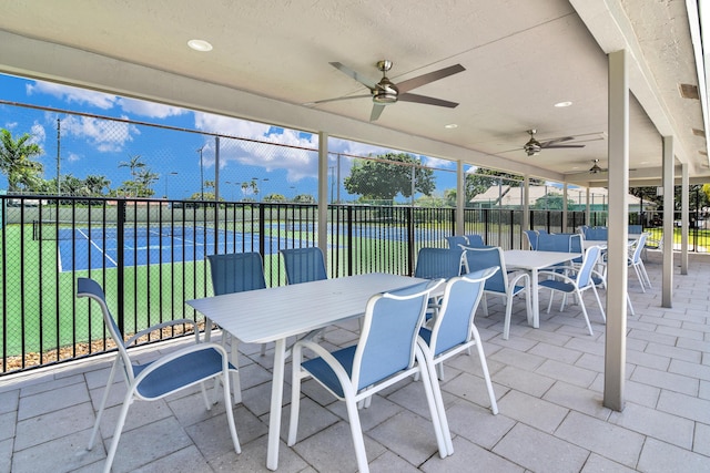 view of patio / terrace featuring ceiling fan