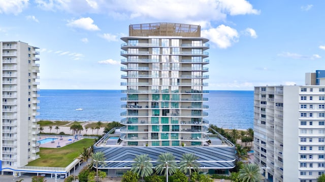 view of property with a water view