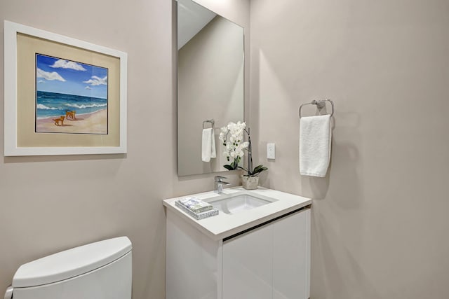 bathroom with vanity and toilet