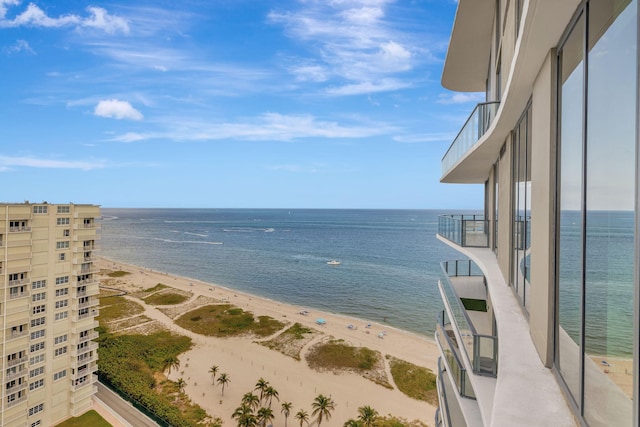 view of water feature with a beach view