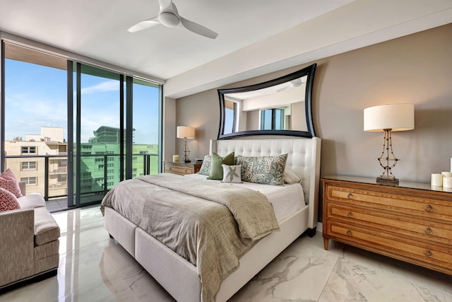 bedroom featuring ceiling fan, floor to ceiling windows, and access to exterior