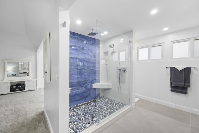 bathroom featuring a tile shower