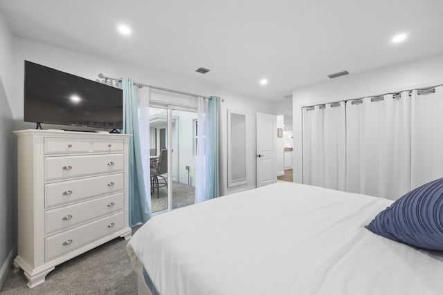 carpeted bedroom featuring access to outside