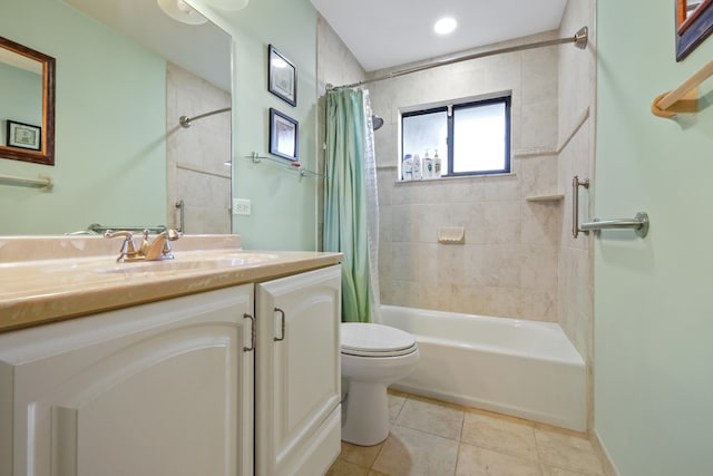 full bathroom featuring vanity, tile patterned flooring, toilet, and shower / bathtub combination with curtain