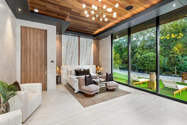 bedroom featuring access to outside, an inviting chandelier, a wall of windows, and wooden ceiling