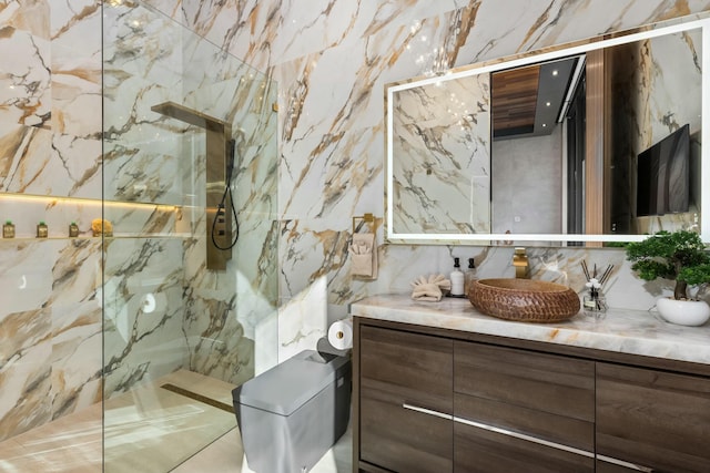 bathroom featuring vanity, tile walls, and walk in shower