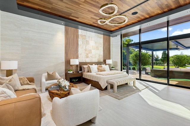 bedroom with expansive windows, wooden ceiling, and access to outside