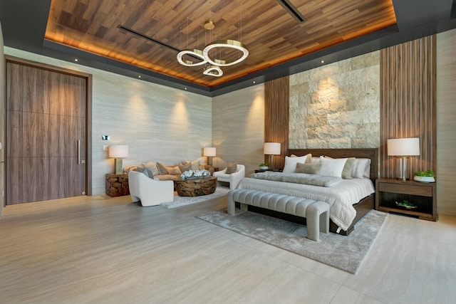 bedroom with a notable chandelier and wood ceiling