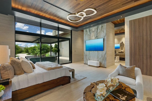 bedroom with light wood-type flooring, access to outside, floor to ceiling windows, and wood ceiling