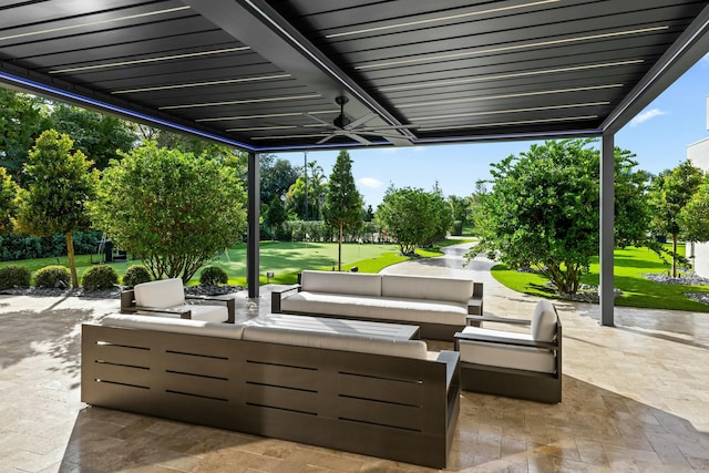 view of patio / terrace with an outdoor living space and ceiling fan