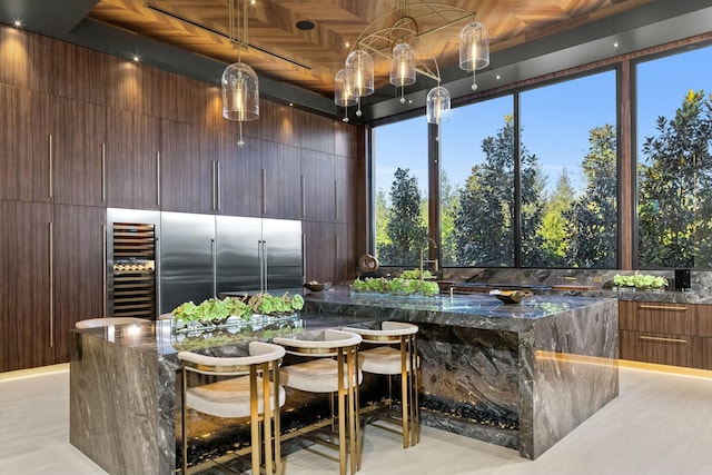 sunroom / solarium featuring wine cooler